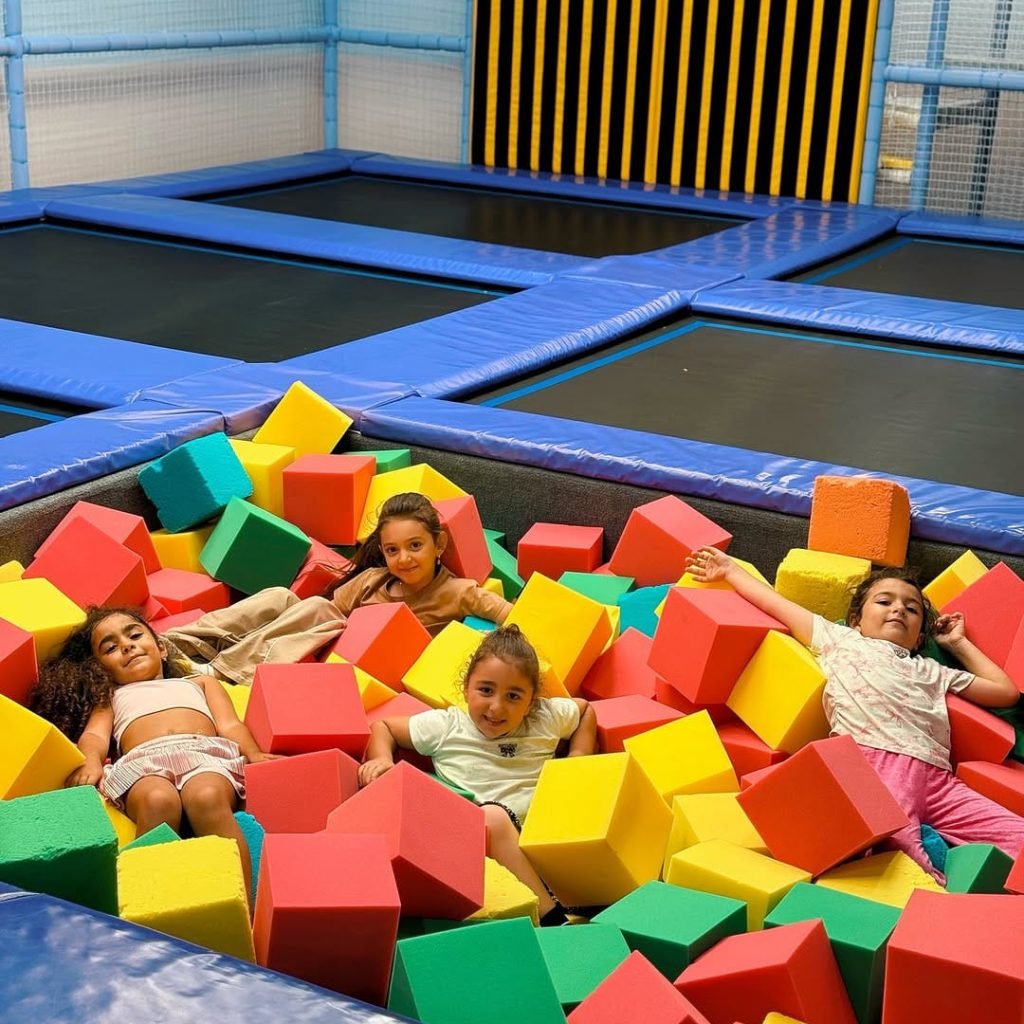 Kids having fun in a indoor playground at a Baku mall, a great example of indoor family entertainment