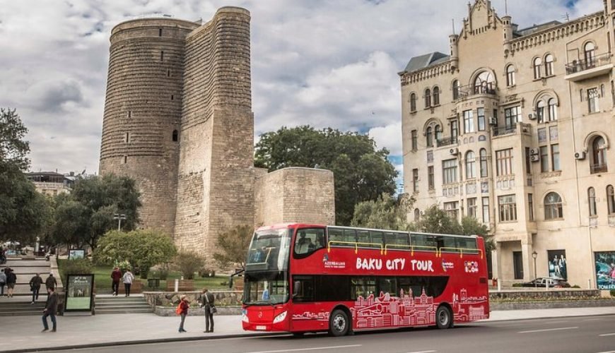 Baku hop-on hop-off city tour bus in front of Maiden Tower